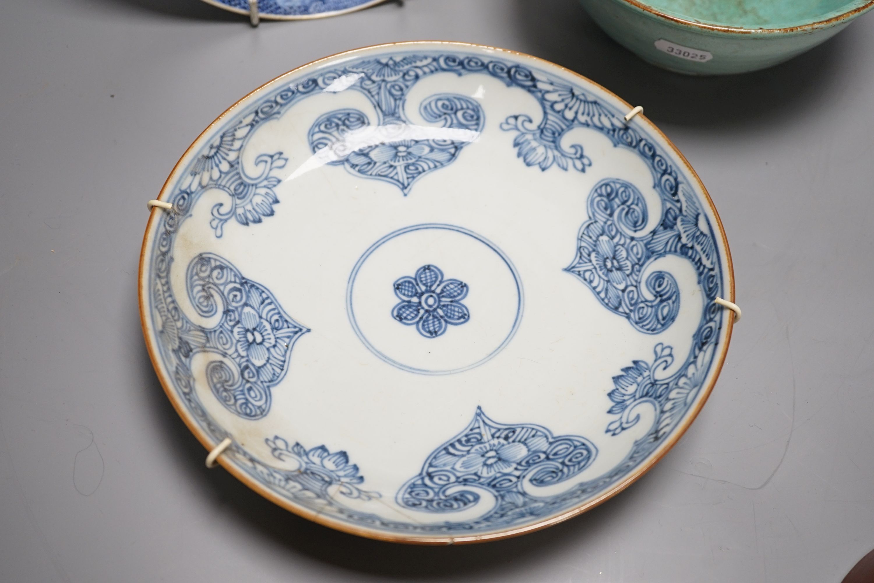 A 19th century blue and white dish, 22cm, together with three others